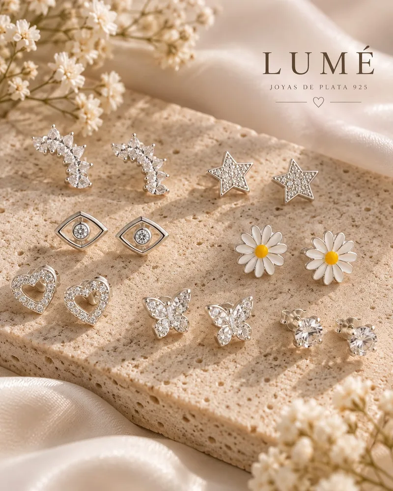 Aros de plata con estrellas, mariposas, corazones, margaritas y ojos
